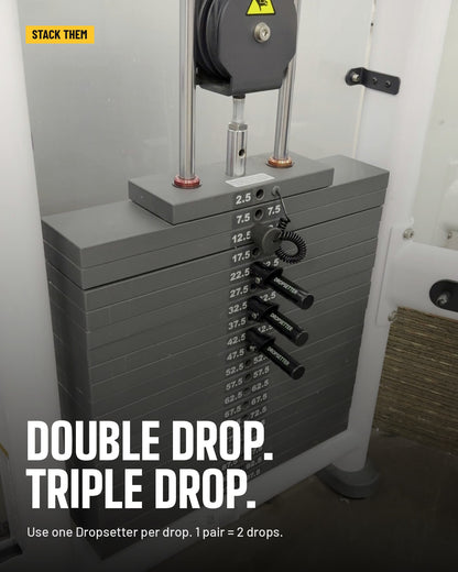 Three Dropsetters lined up in a weight stack for a triple drop set