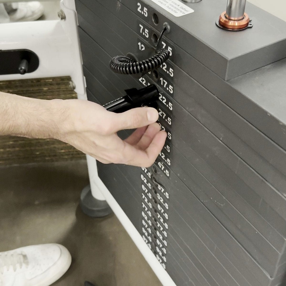 Putting the regular pin in the weight stack